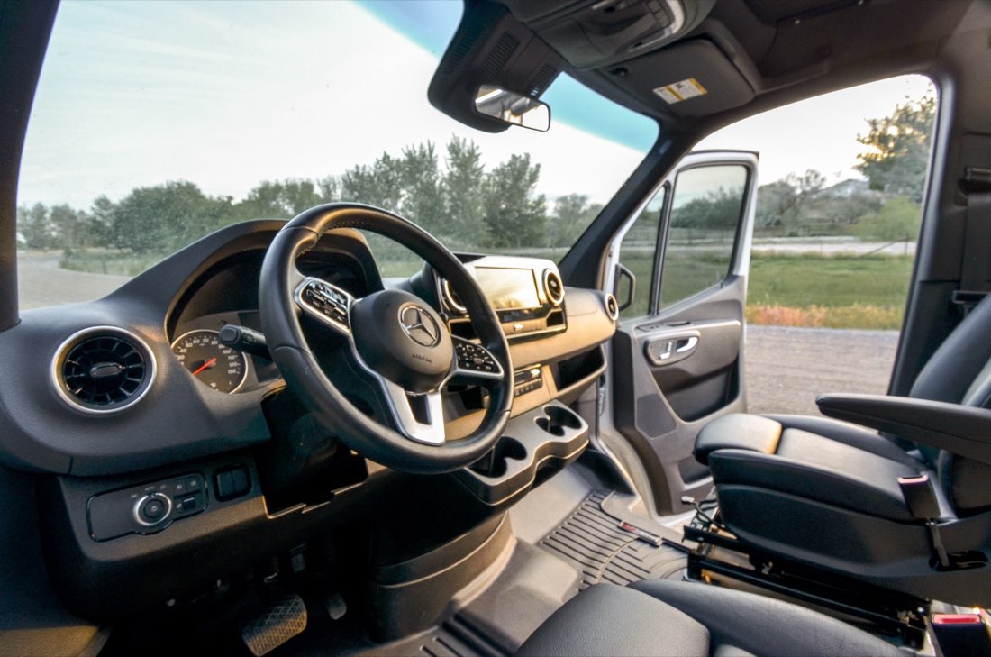 Sprinter cab with steering wheel and touchscreen
